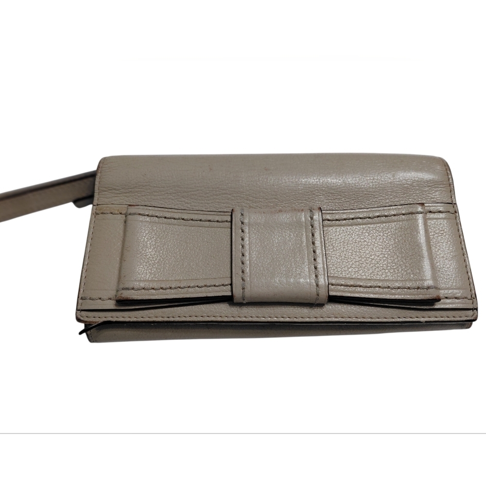👜kate spade taupe bow leather wristlet